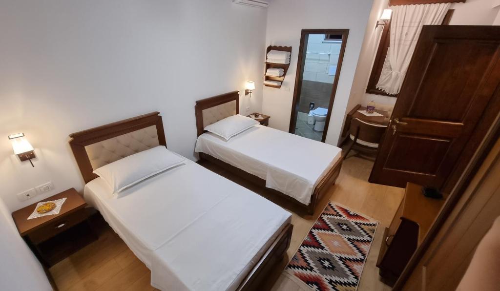 Postel nebo postele na pokoji v ubytování Master Hotel