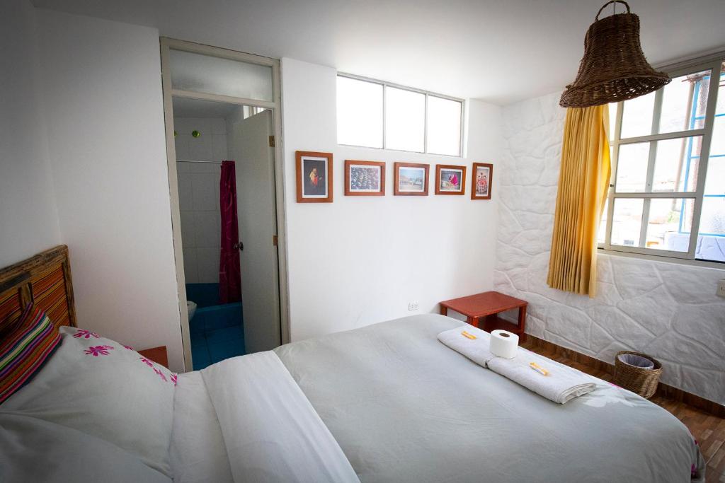 
Ein Bett oder Betten in einem Zimmer der Unterkunft Homestay Pachamama
