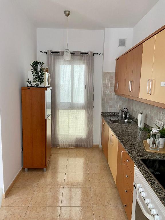 Kuchyňa alebo kuchynka v ubytovaní Namar apartamento