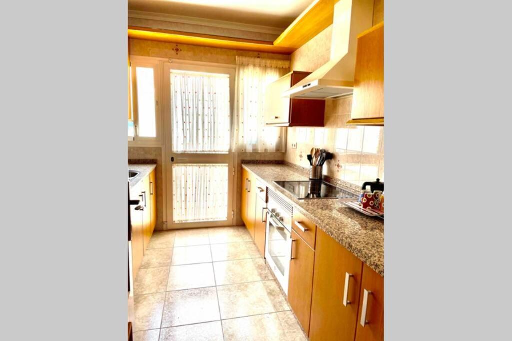 Kuchyňa alebo kuchynka v ubytovaní Apartamento familiar 2 habitaciones - Terrazas-WiFi