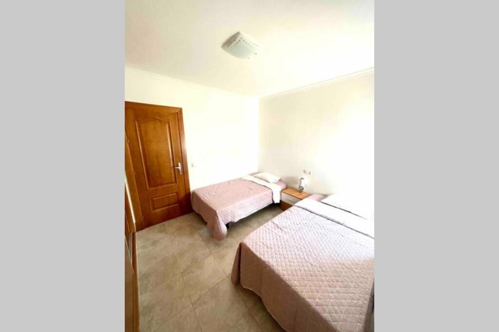Posteľ alebo postele v izbe v ubytovaní Apartamento familiar 2 habitaciones - Terrazas-WiFi