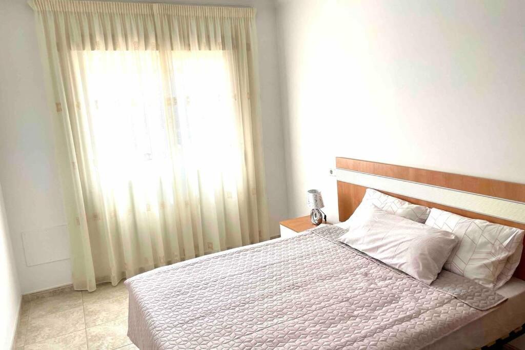 Posteľ alebo postele v izbe v ubytovaní Apartamento familiar 2 habitaciones - Terrazas-WiFi