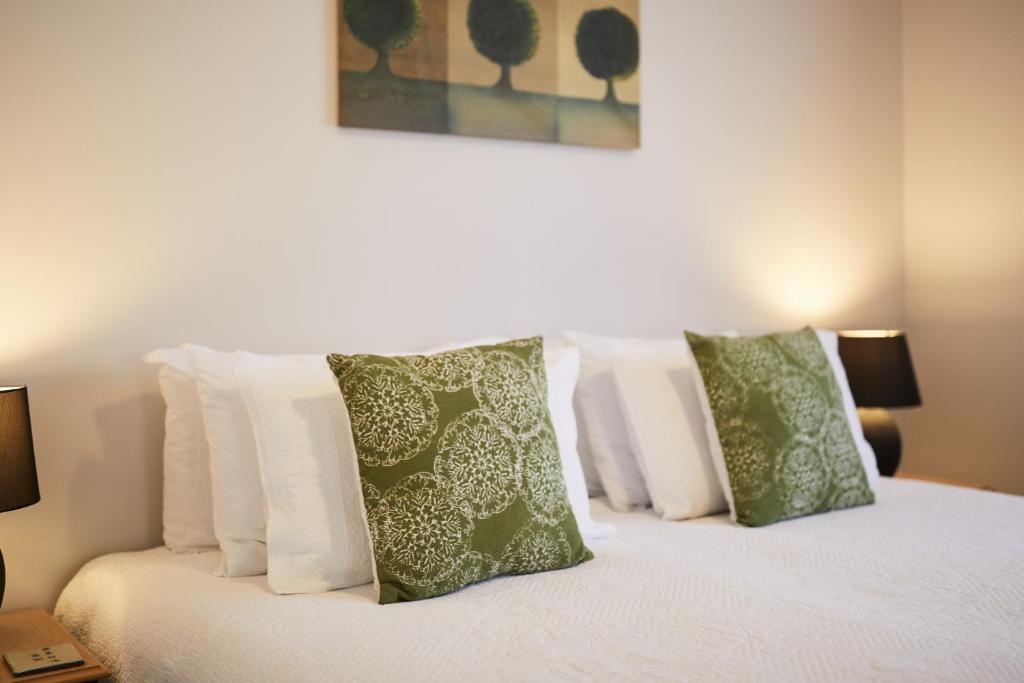 Postel nebo postele na pokoji v ubytování Blenheim Palms Motel