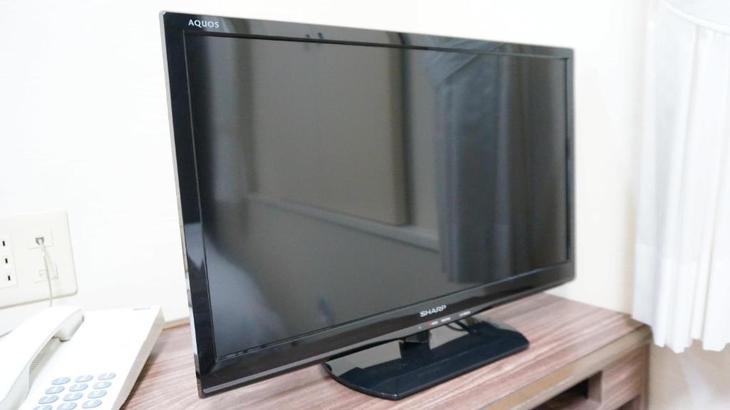 TV a/nebo společenská místnost v ubytování The Kato Hotel