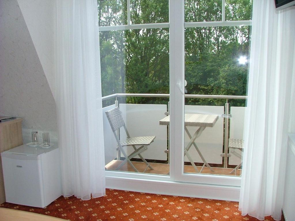 Balkón nebo terasa v ubytování Hotel Thule