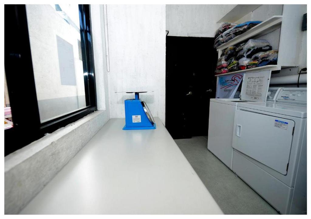 Kuchyň nebo kuchyňský kout v ubytování Monchere Dormitory