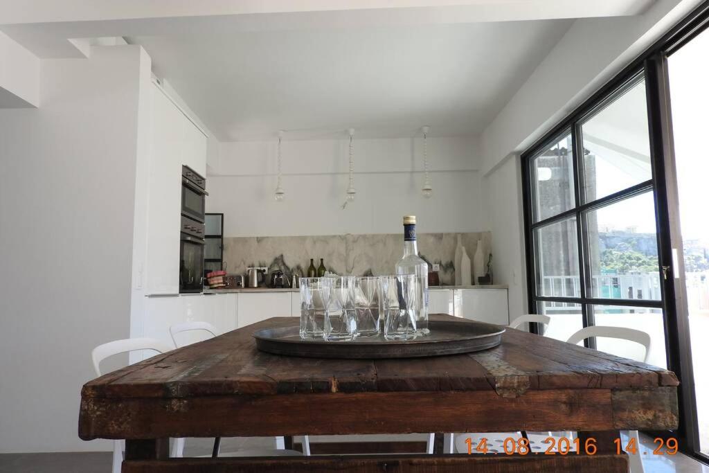 Kuchyňa alebo kuchynka v ubytovaní Central Athens Super View Loft
