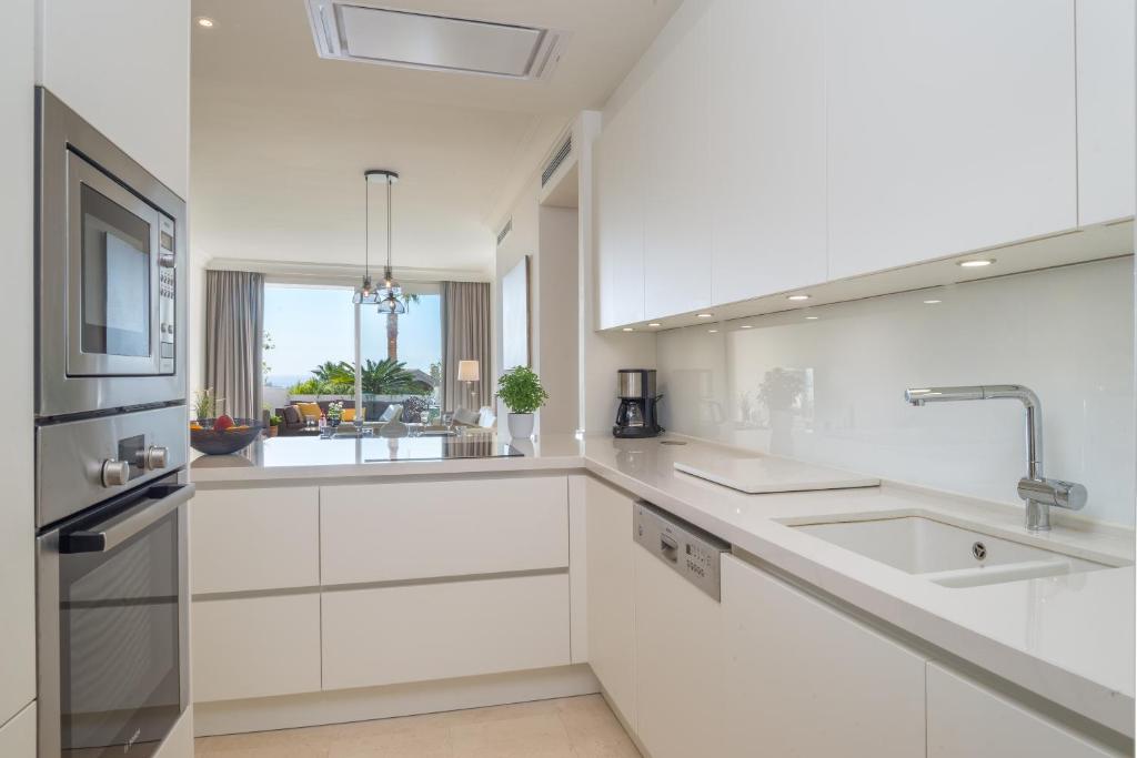 Kuchyň nebo kuchyňský kout v ubytování Seaview Flat Benahavis-marbella