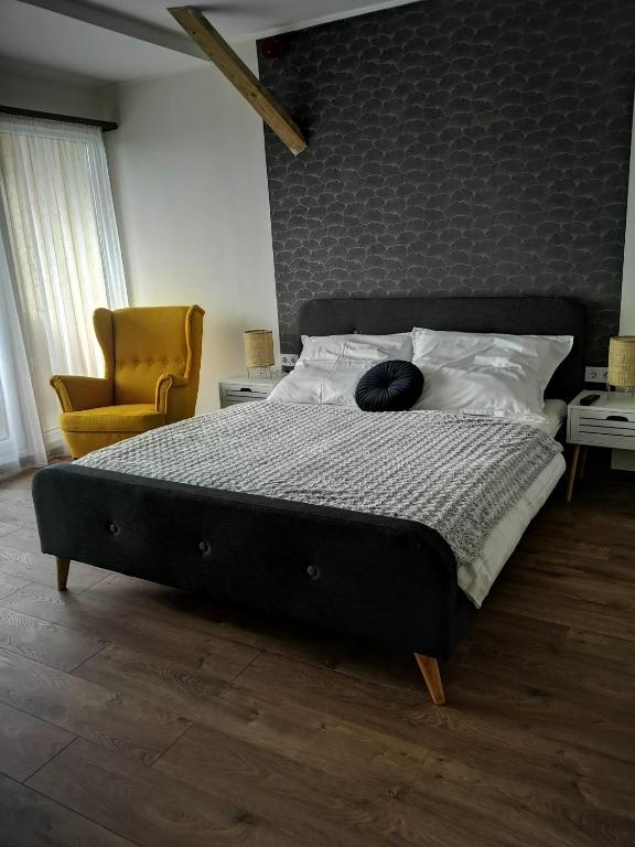 Postel nebo postele na pokoji v ubytování Főnix Badacsony