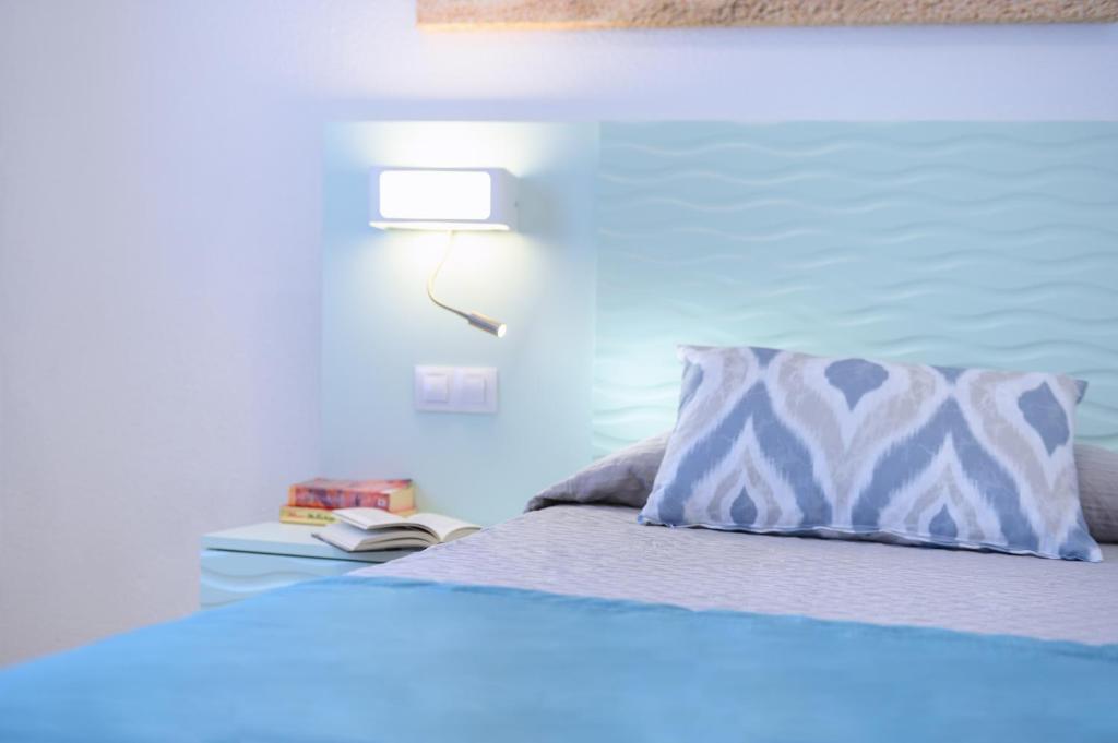 Postel nebo postele na pokoji v ubytování Valle Marina Apartamentos