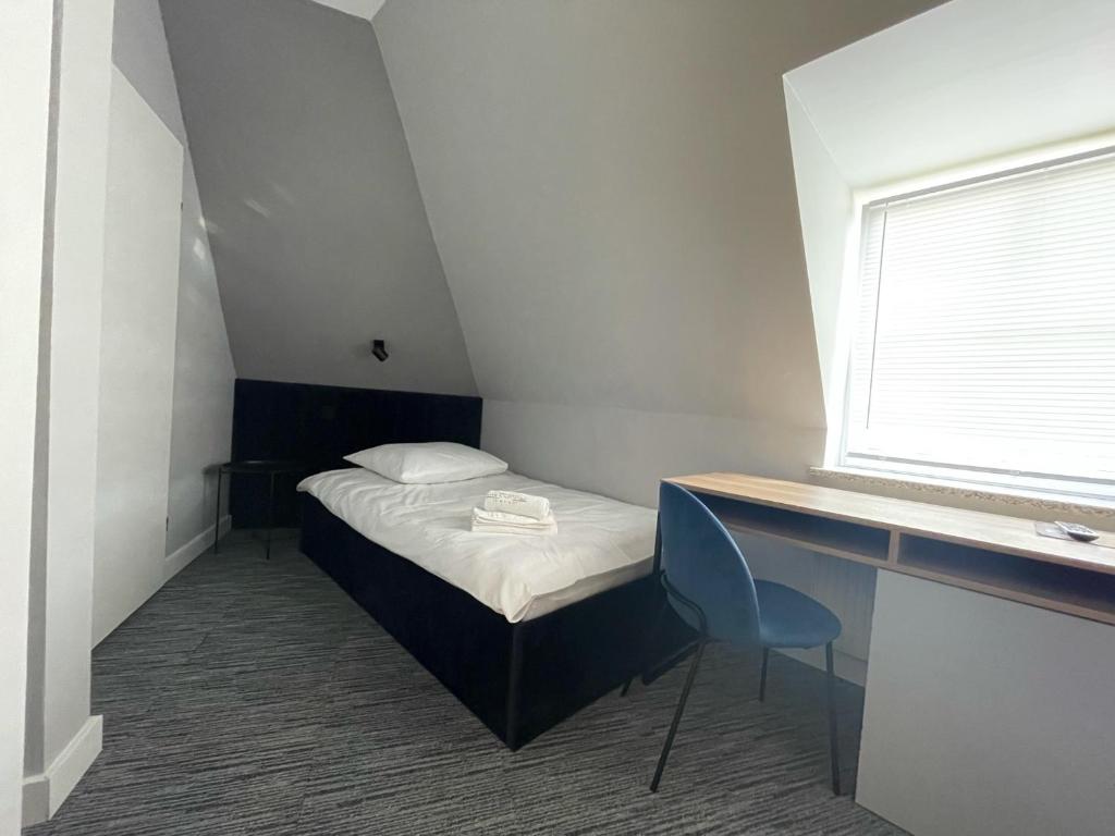 Posteľ alebo postele v izbe v ubytovaní Hotel Made in Napoli by Siervo Międzybórz