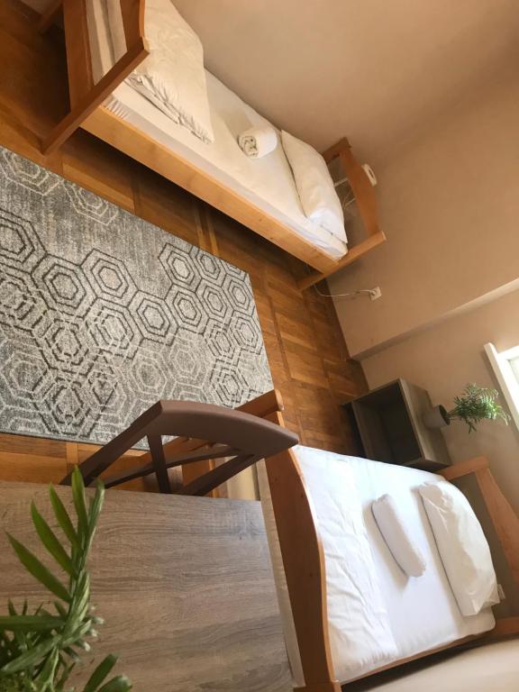 Postel nebo postele na pokoji v ubytování Pelican Guest House & Hostel