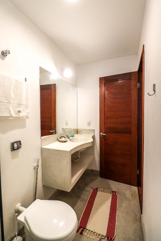 Koupelna v ubytování Pipa Surf Yoga Apartamento e Suítes com cozinha completa