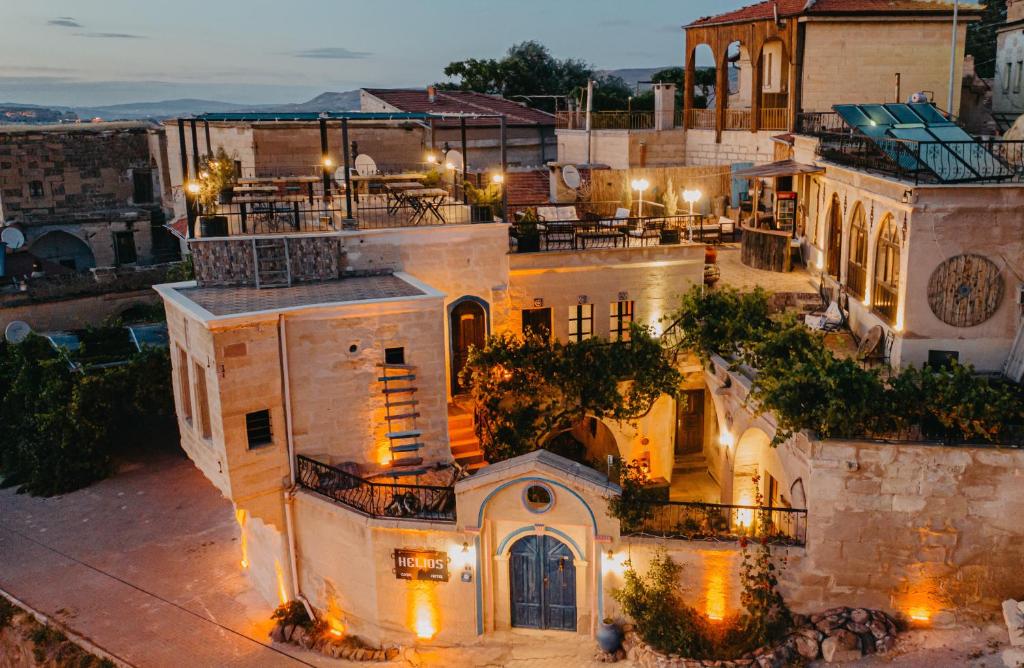 an aerial view of a building with lights at Helios Cave Kapadokya in Urgup