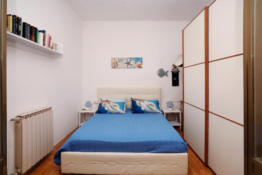 Łóżko lub łóżka w pokoju w obiekcie Villa Lardarina