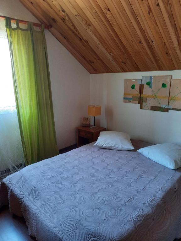 Postel nebo postele na pokoji v ubytování GÎTE Le Calou Pilon