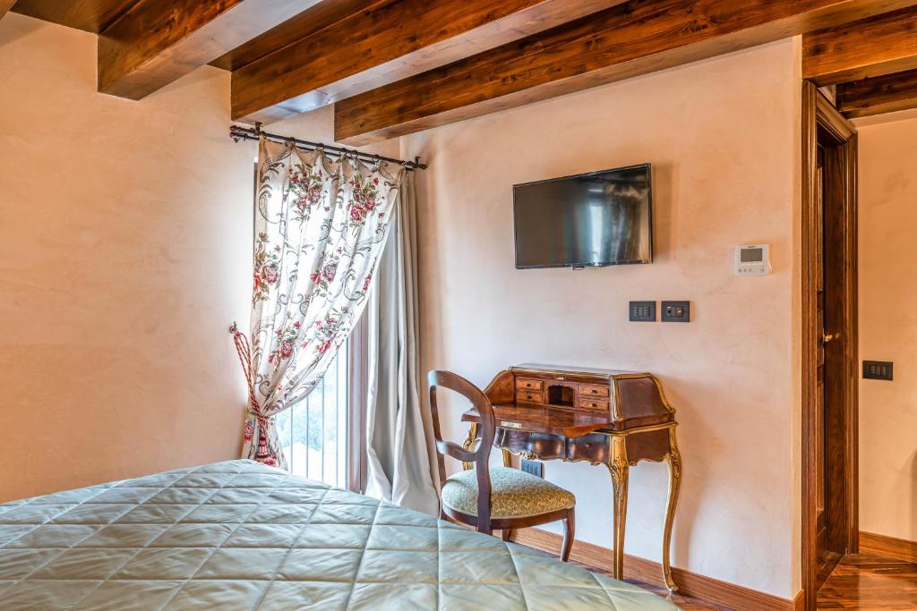 TV a/nebo společenská místnost v ubytování Bar Vitelli Charming suites