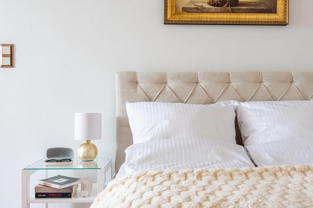 Posteľ alebo postele v izbe v ubytovaní Prestige Apartament Przy Nosalu