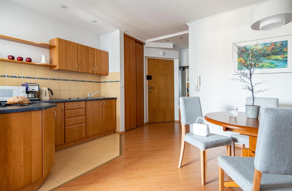 Kuchyňa alebo kuchynka v ubytovaní Prestige Apartament Przy Nosalu