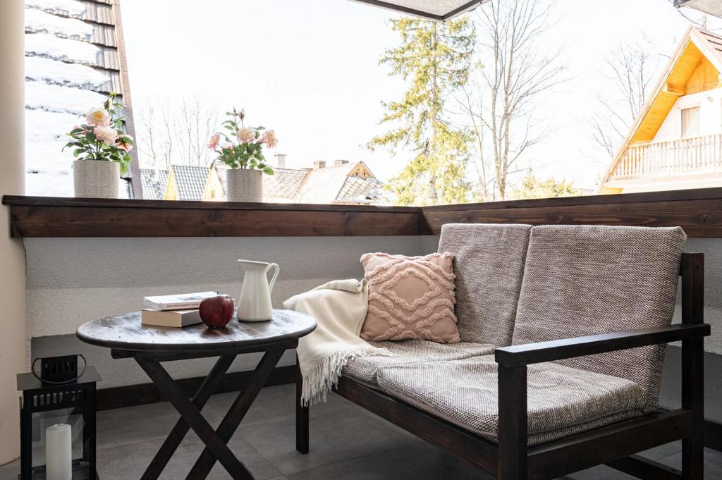 Posedenie v ubytovaní Prestige Apartament Przy Nosalu