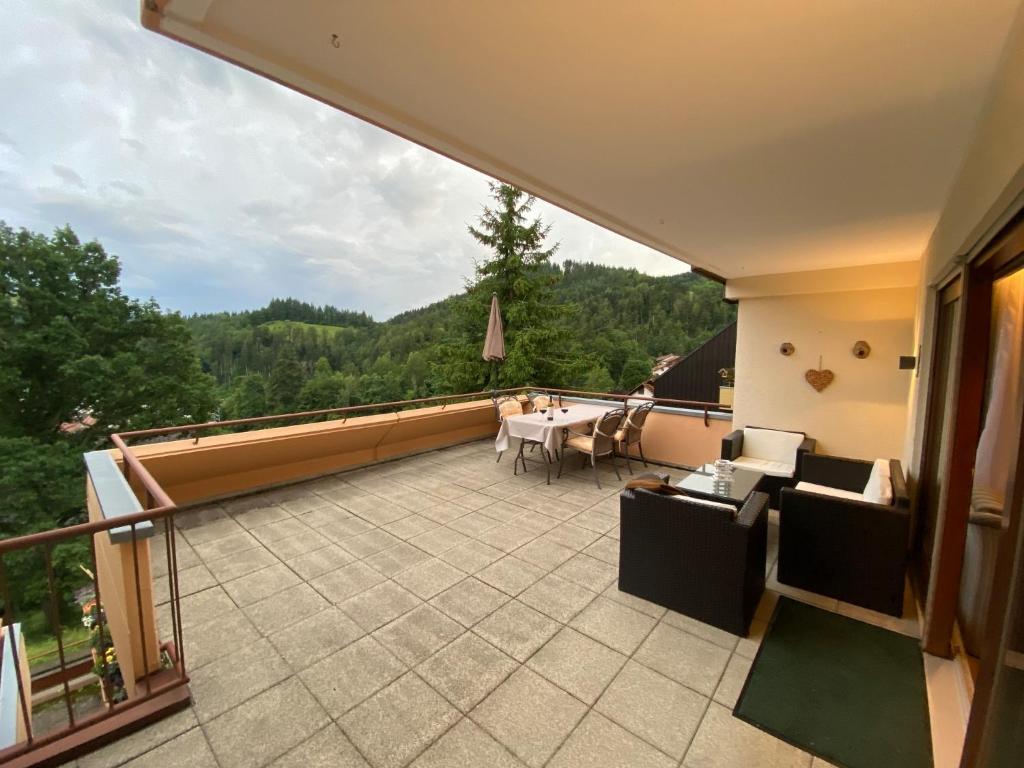 a balcony with a view of a living room at Ferienwohnung Schönblick in Schönau im Schwarzwald