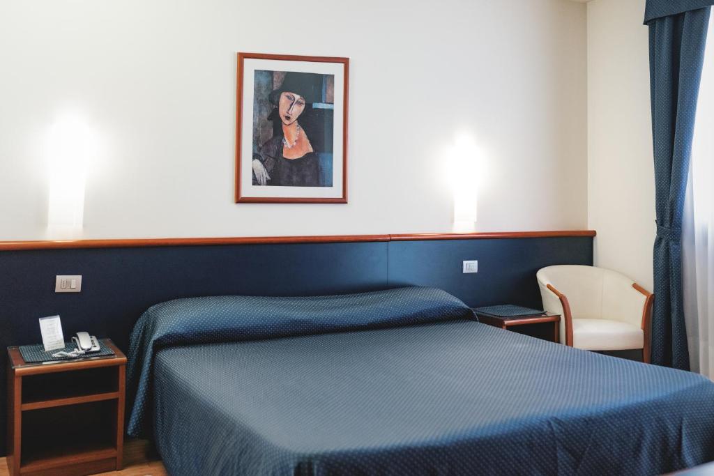 Posteľ alebo postele v izbe v ubytovaní Hotel Crystal