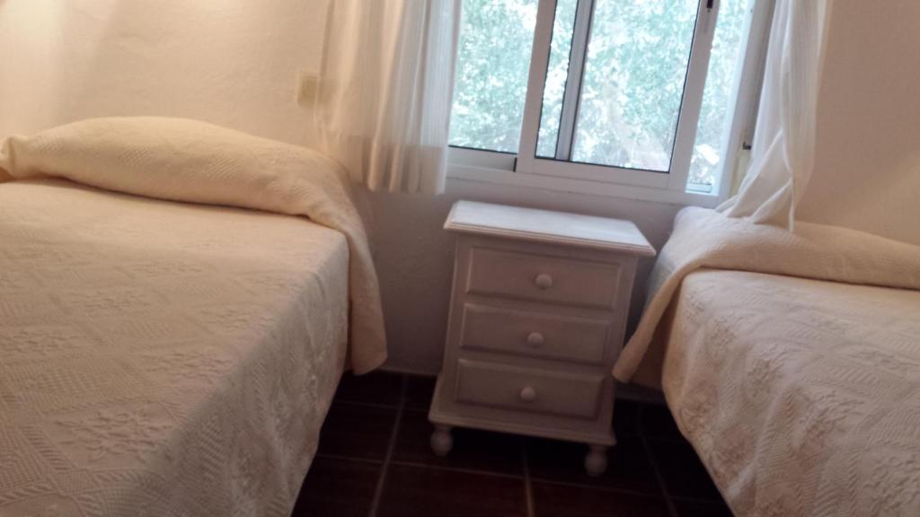 A bed or beds in a room at Casas Isabel