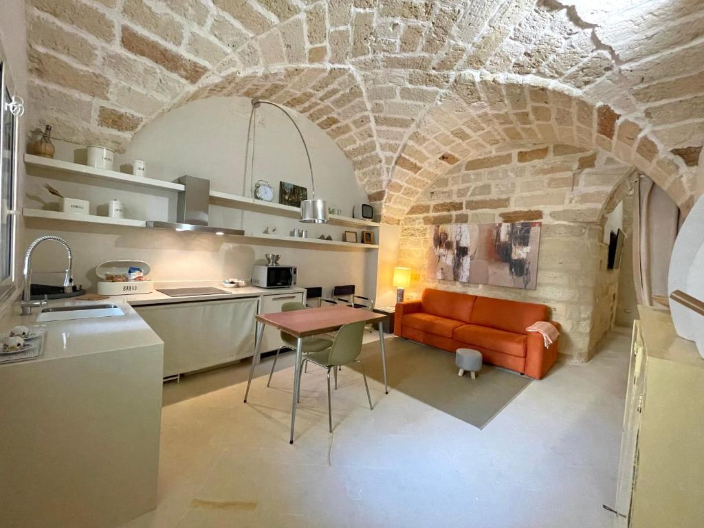 Kuchyň nebo kuchyňský kout v ubytování Palazzo de Carlo e il parco dei 7 pozzi