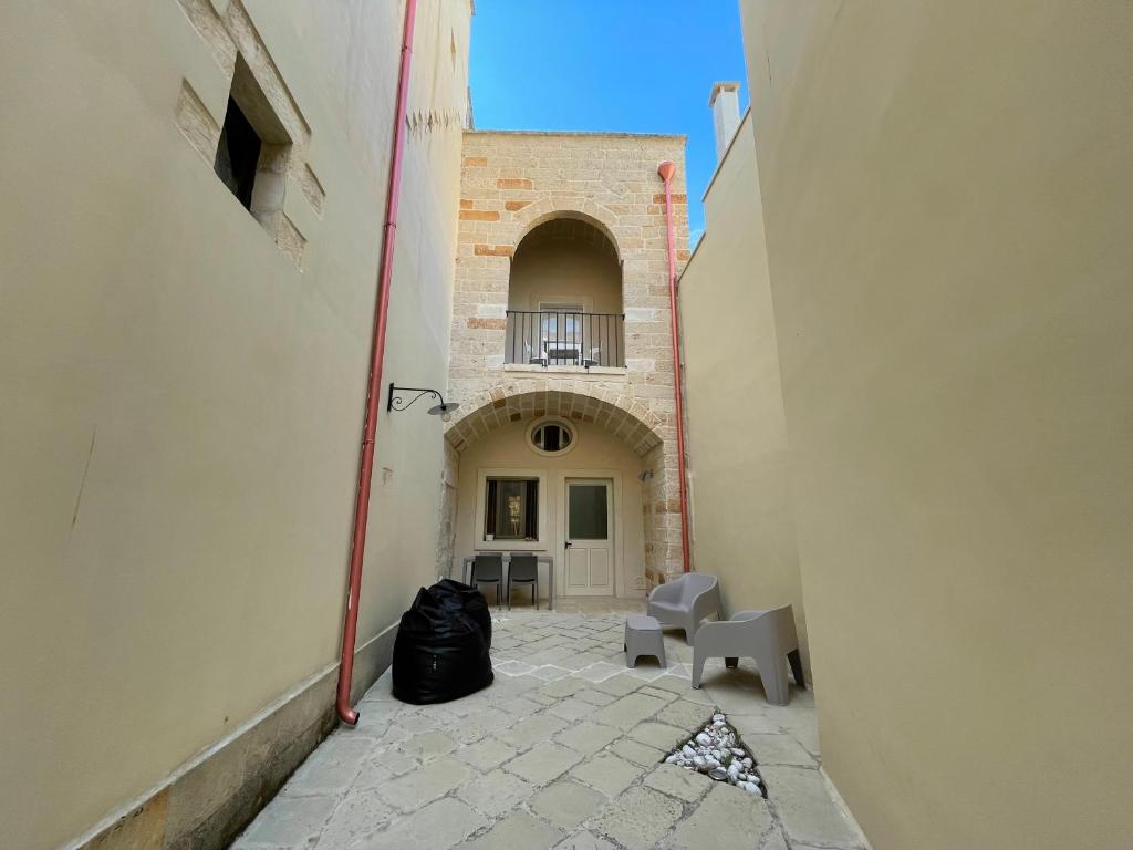 Domácí mazlíčci ubytovaní s hosty v ubytování Palazzo de Carlo e il parco dei 7 pozzi
