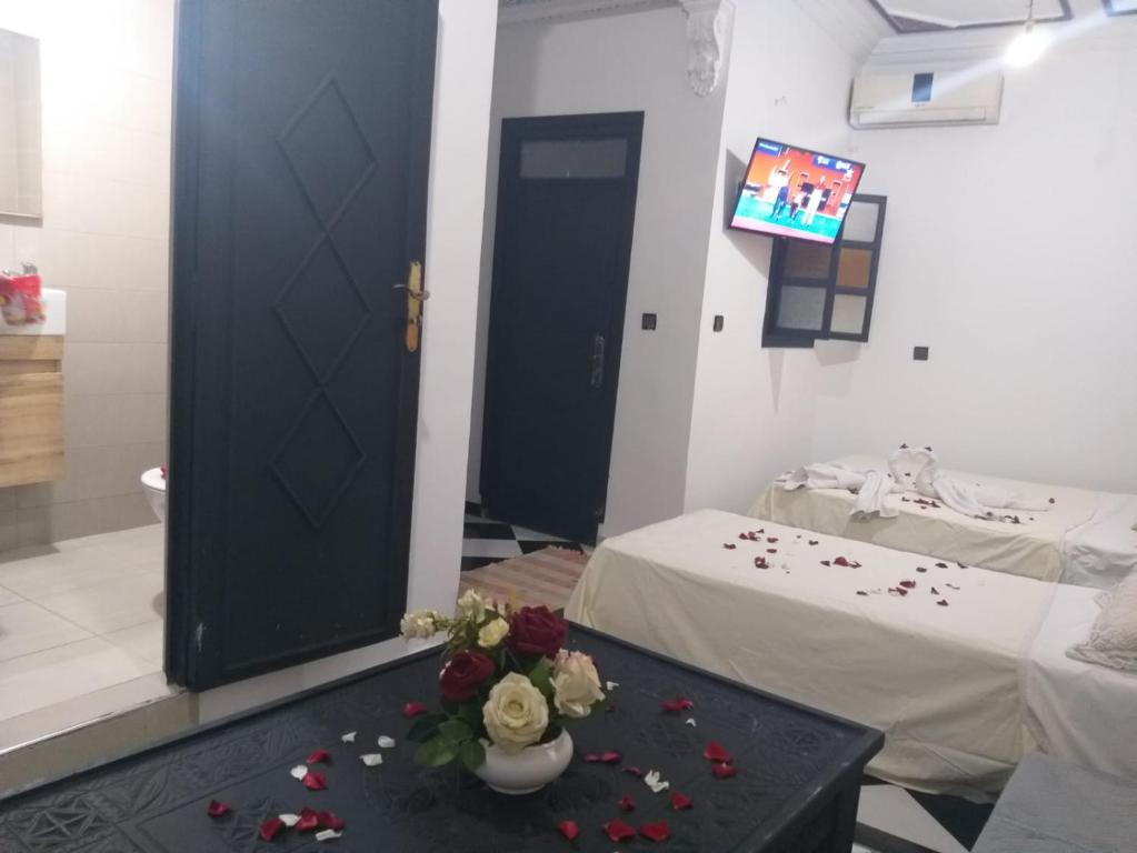 Postel nebo postele na pokoji v ubytování Hôtel Agnaou