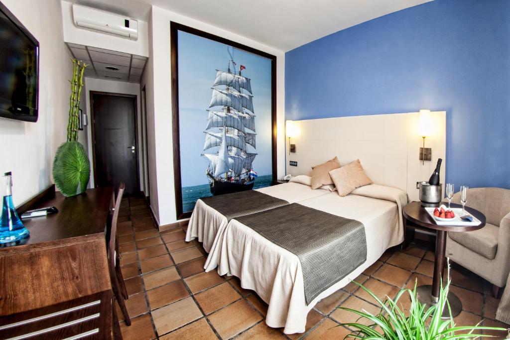 Cama o camas de una habitación en Hotel Albaida Nature