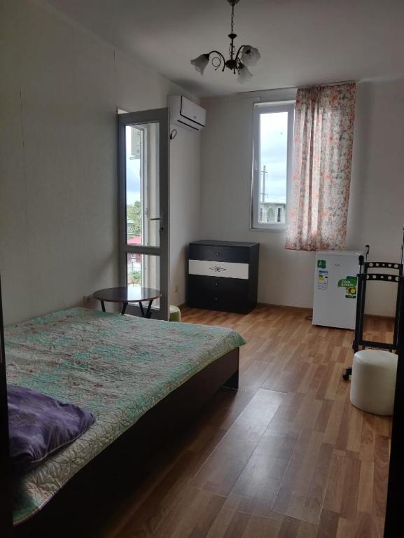 Postel nebo postele na pokoji v ubytování Lily Pearls Inn