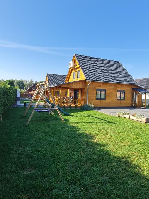 Vonkajšia záhrada v ubytovaní Słoneczny Zakątek