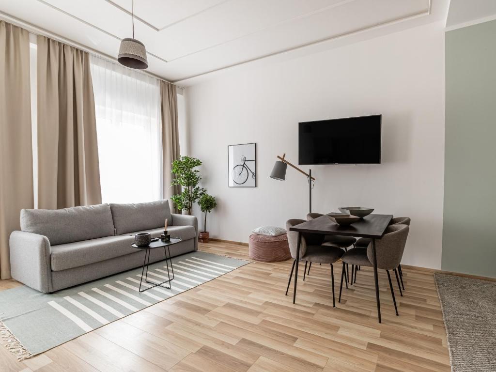 TV a/nebo společenská místnost v ubytování limehome Villach Kirchenplatz