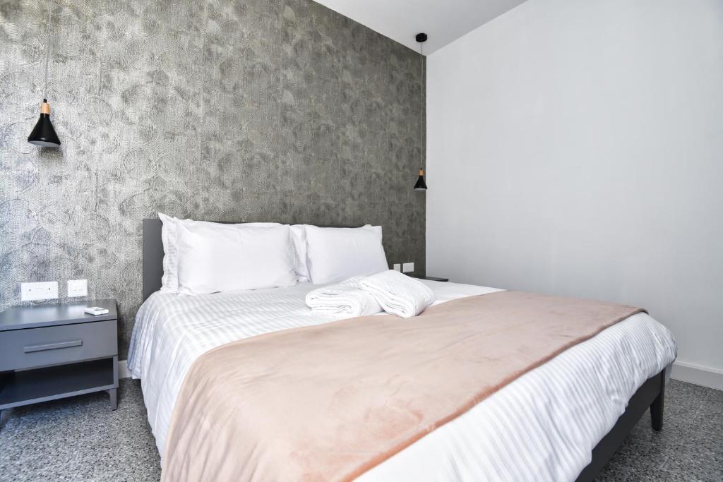 Postel nebo postele na pokoji v ubytování Xeuchia Accommodation