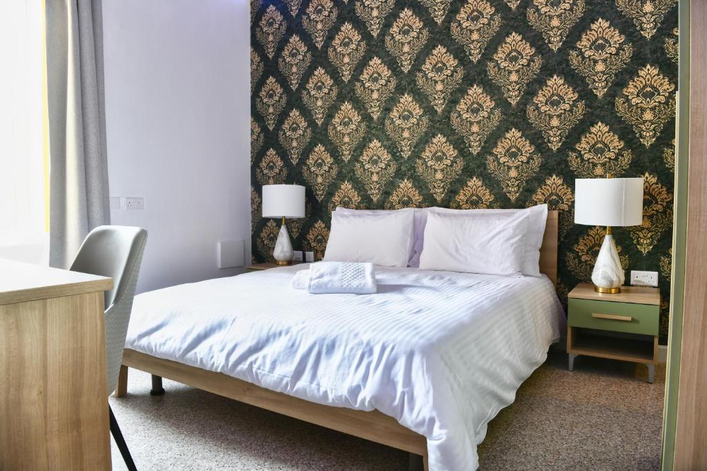 Postel nebo postele na pokoji v ubytování Xeuchia Accommodation