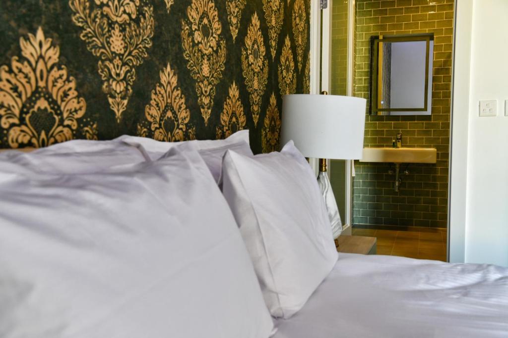 Postel nebo postele na pokoji v ubytování Xeuchia Accommodation