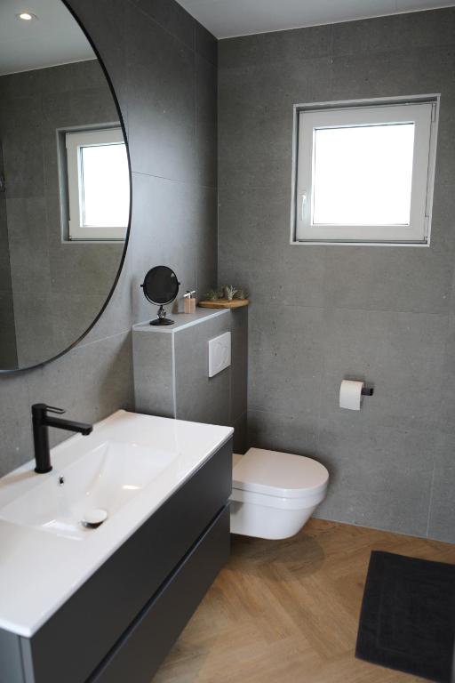Koupelna v ubytování Beachhouse Renesse 2645
