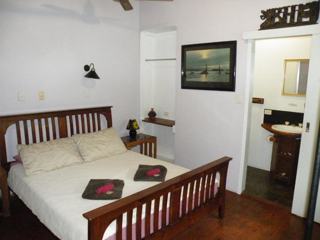 Postel nebo postele na pokoji v ubytování Epiphyte B & B