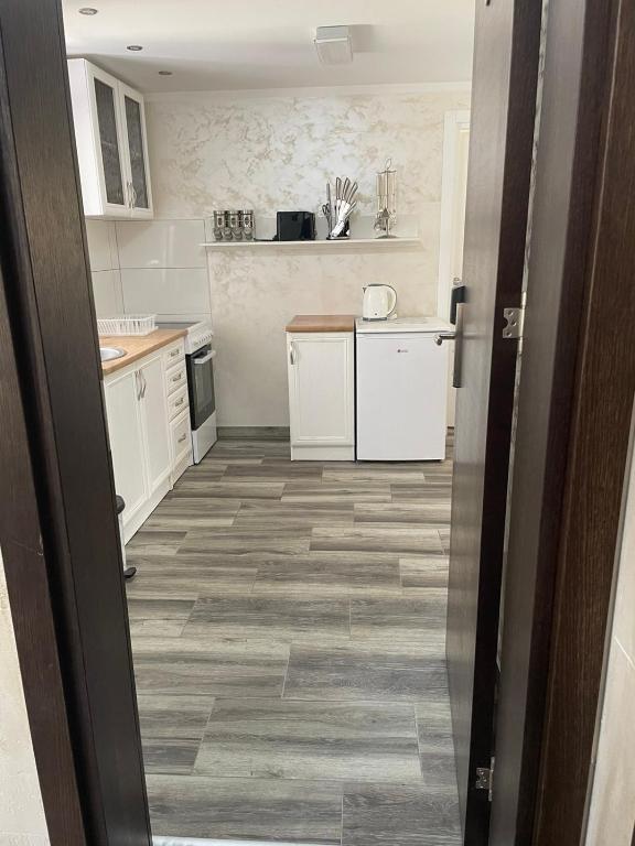 Kuchyň nebo kuchyňský kout v ubytování Apartman 67