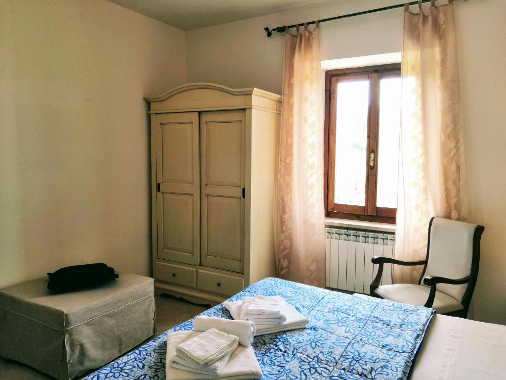 Postel nebo postele na pokoji v ubytování Il Fiordaliso