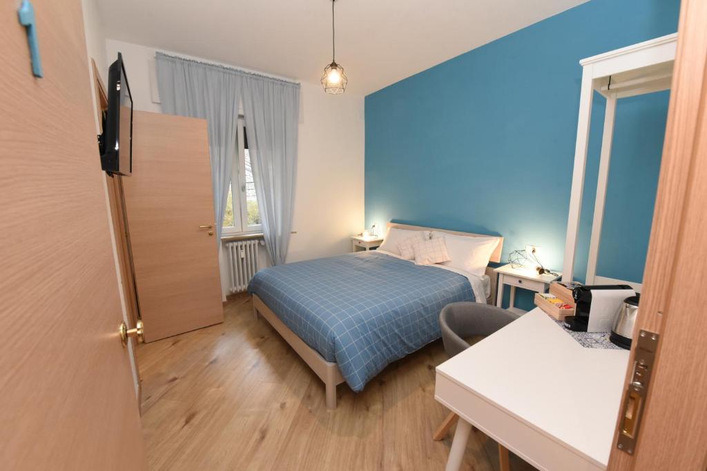 Postel nebo postele na pokoji v ubytování Geordie's