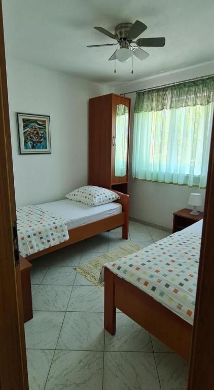 Postel nebo postele na pokoji v ubytování House More