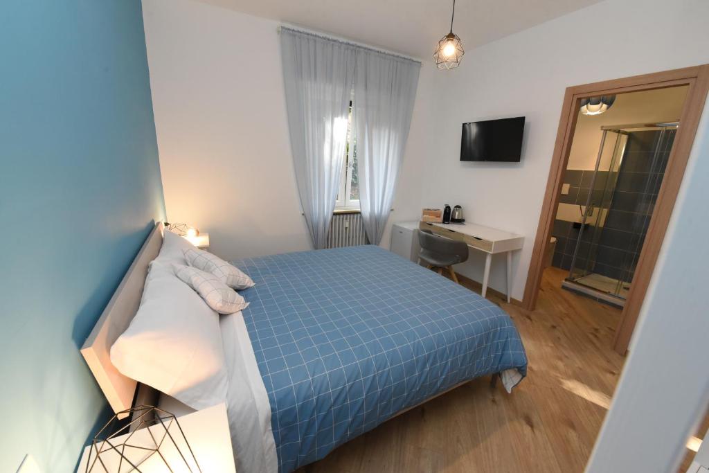 Postel nebo postele na pokoji v ubytování Geordie's