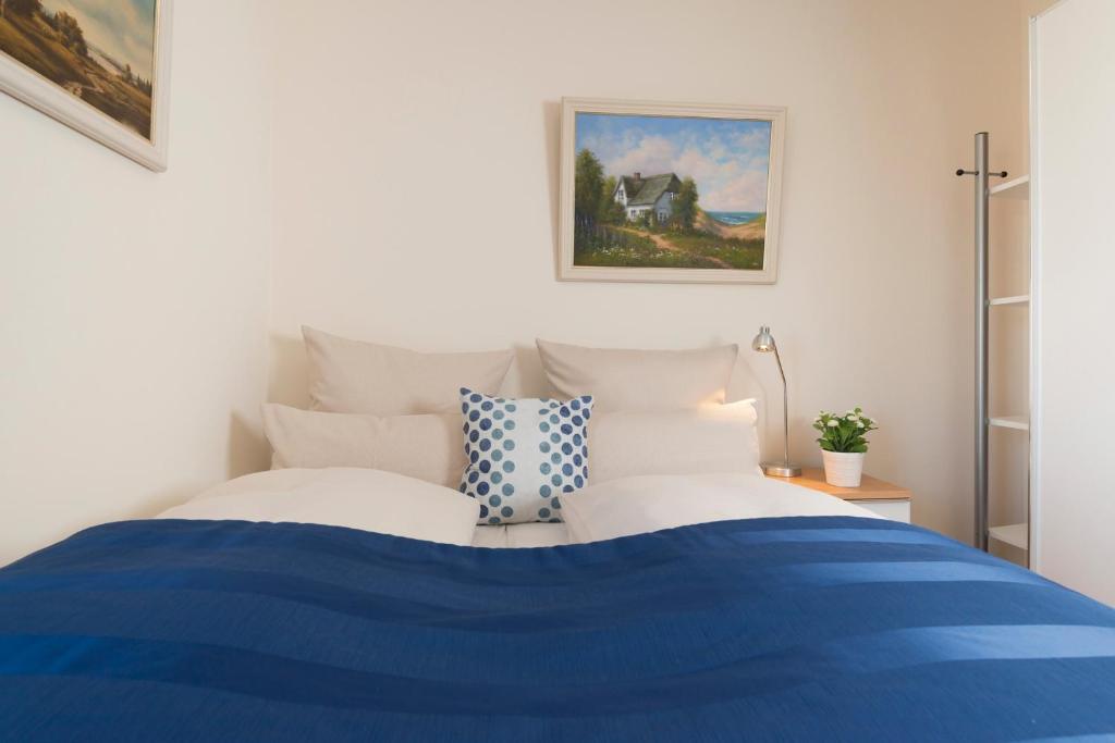 Säng eller sängar i ett rum på Ostsee - Appartement Nr 182 "Sunshine Oase" im Strand Resort