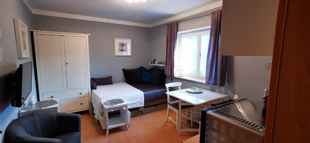 
Ein Bett oder Betten in einem Zimmer der Unterkunft Ferienwohnung Milan
