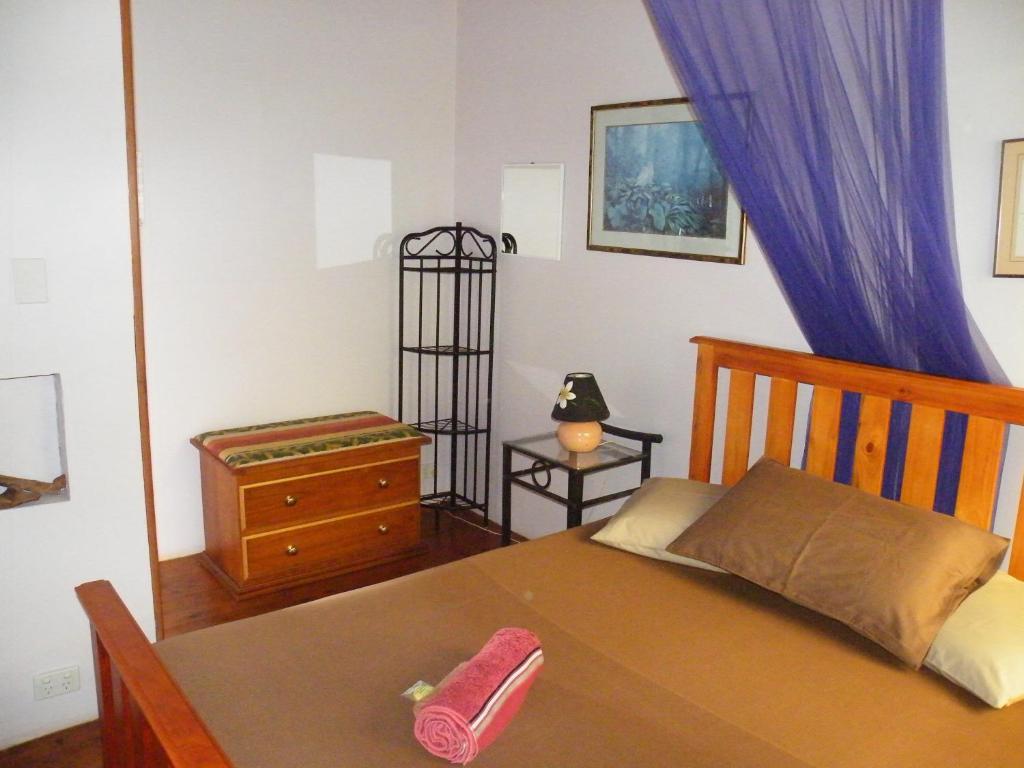 Postel nebo postele na pokoji v ubytování Epiphyte B & B