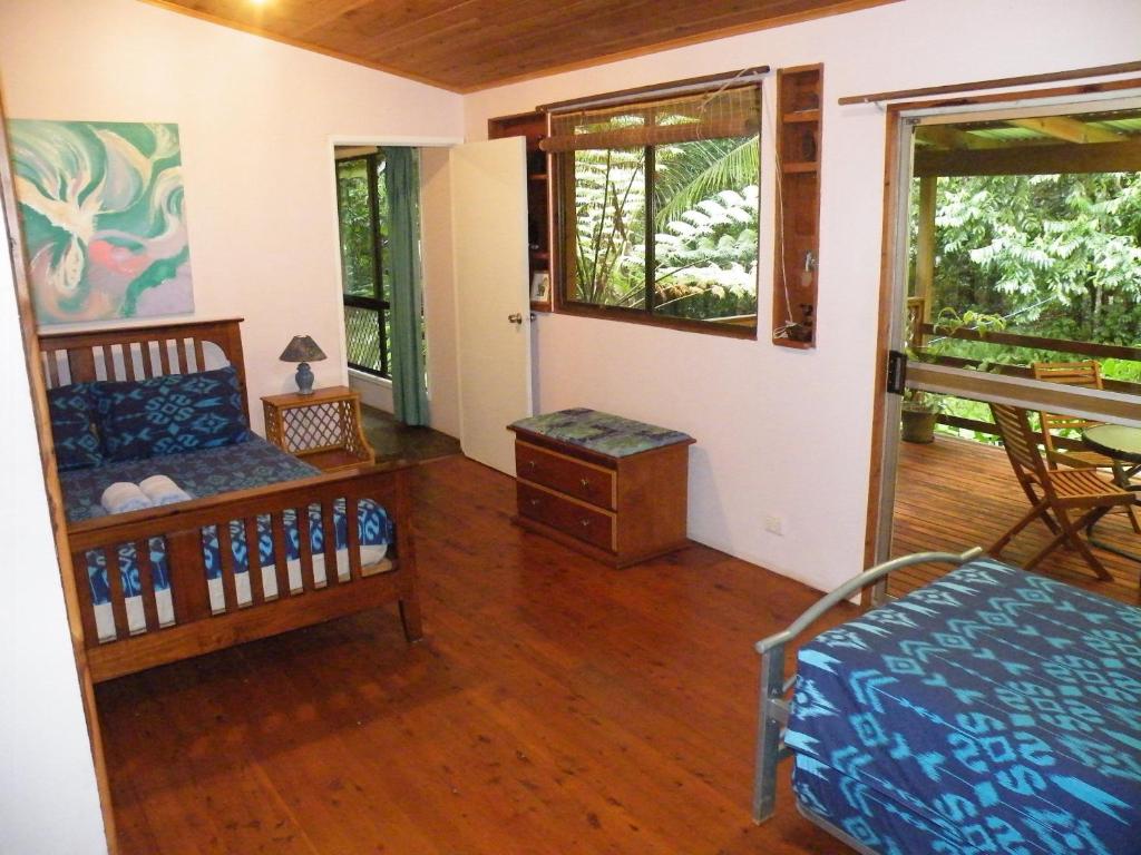 Postel nebo postele na pokoji v ubytování Epiphyte B & B