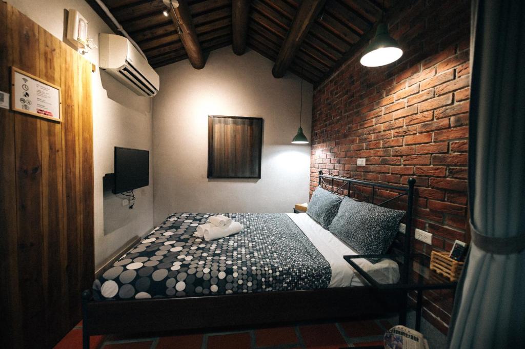 Poste&#x13E; alebo postele v izbe v ubytovan&iacute; Kinba Guest House