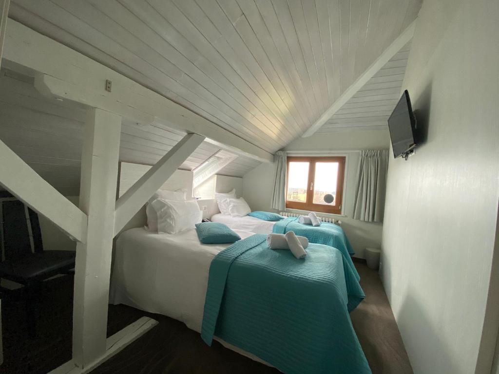 Postel nebo postele na pokoji v ubytování Auberge de Confignon